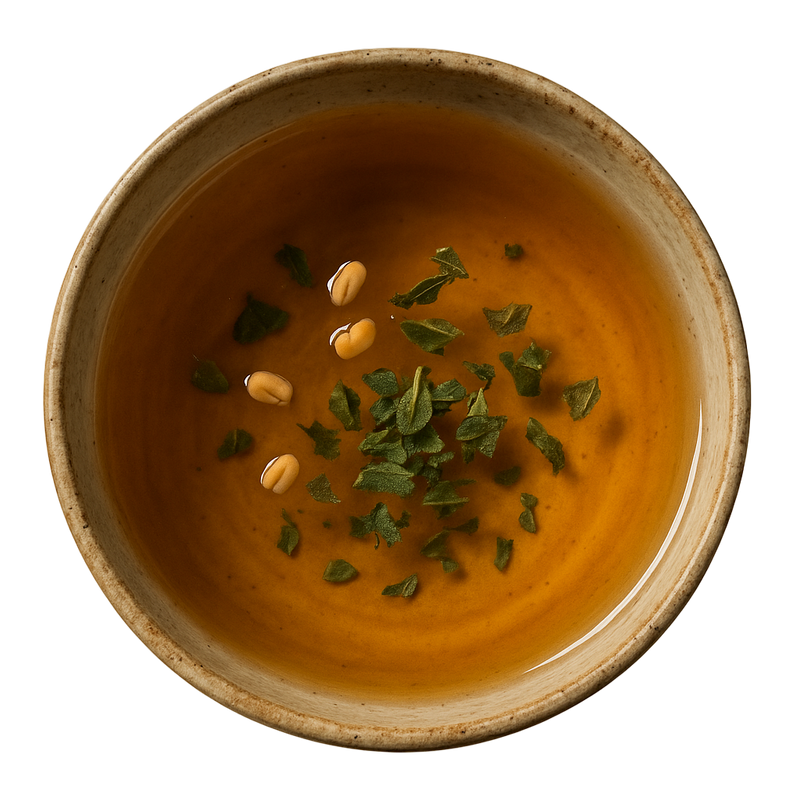 cup of tea with fenugreek insulin plant leaves and dried ivy gourd from ayoni wellness