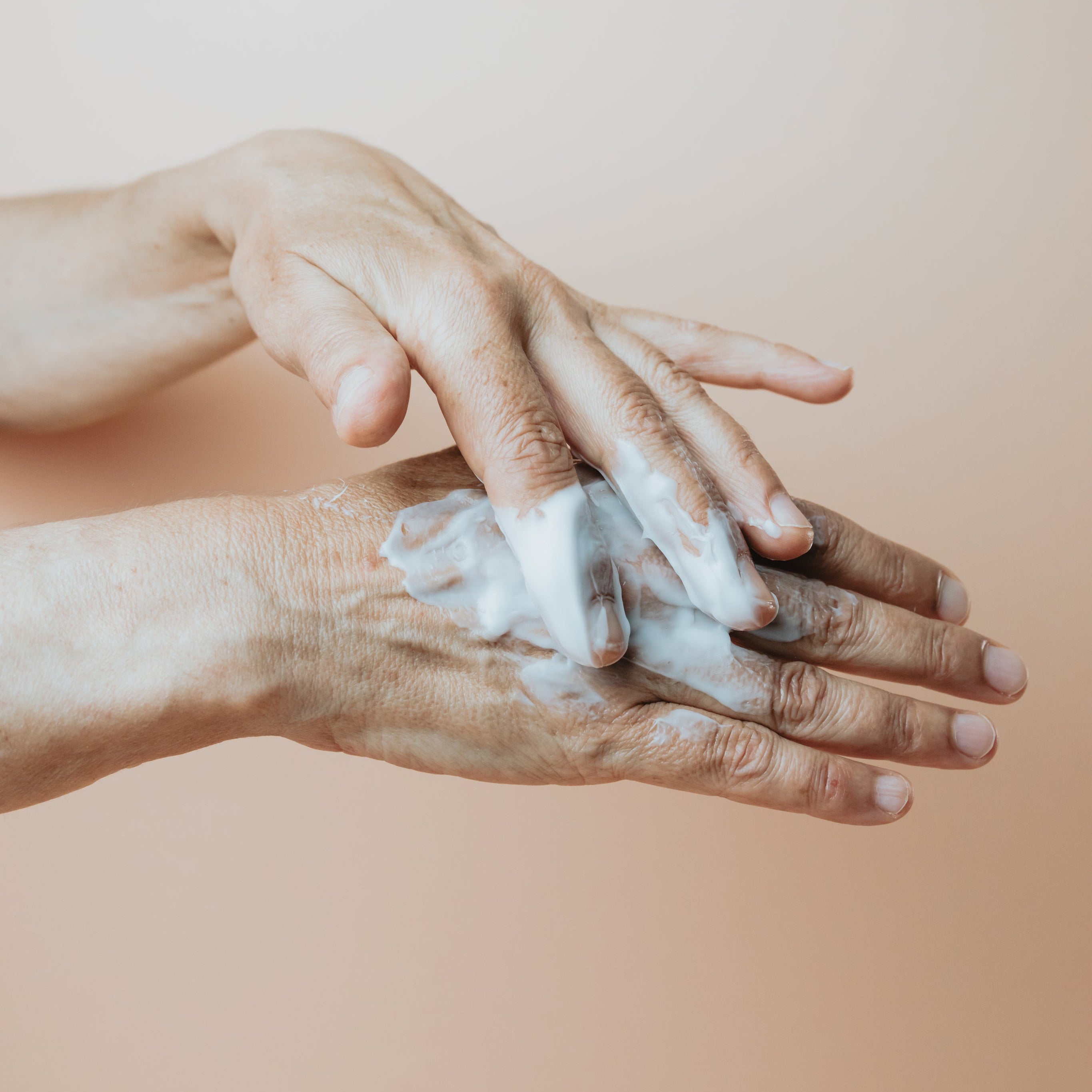 one-hand-lathers-the-other-with-hand-lotion.jpg